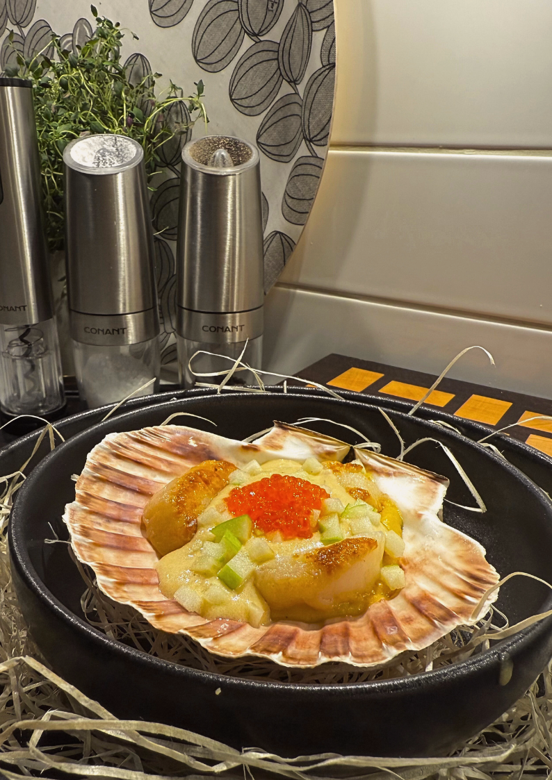 Pilgrimsmusslor med pumpapuré och reducerad grädde